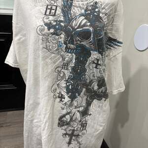 Archaic Y2K Skull and Cross Wings AOP Graphic T-Shirt